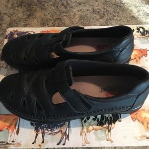 Woman’s SAS shoes. Black in color with Velcro strap.